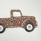 Leopard Pickup Truck Sign: Embossed Metal Door Hanger